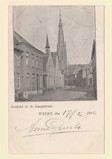 Gezicht in de Langstraat met op de achtergrond de St. Martinustoren, rond 1900